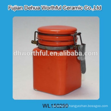 Colorful orange ceramic seal pot